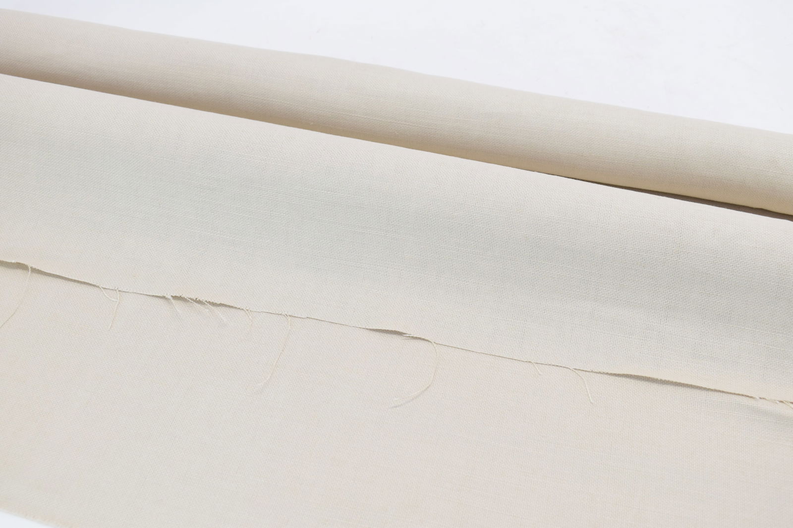 Two Rolls Ivory Brunschwig & Fils Linen: Two Rolls Ivory Brunschwig & Fils LinenTwo Rolls Ivory Brunschwig & Fils Linen; used condition, slightly musty scent; one roll measures approximately 1 yard x 54", the other measures approximatel