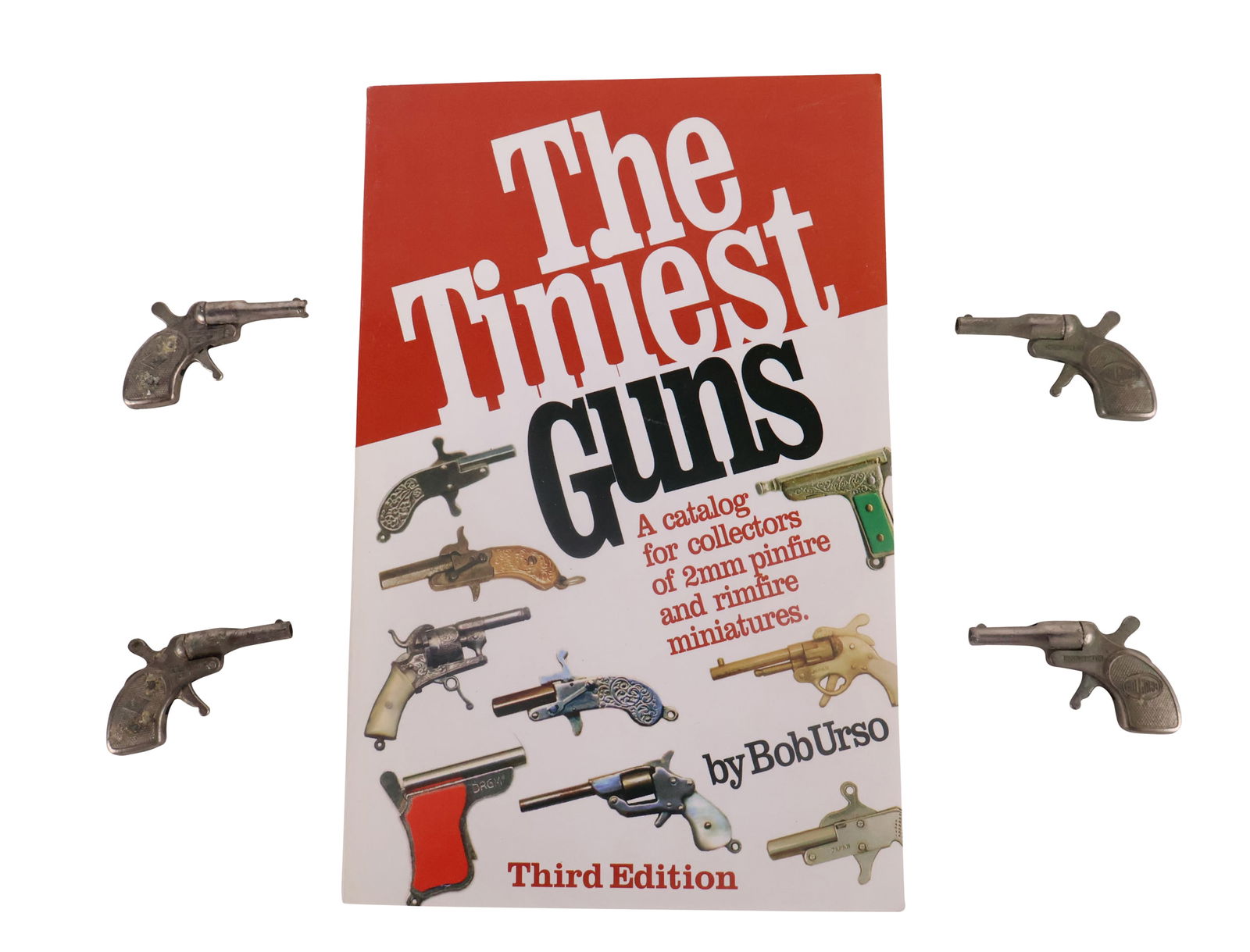 Four Vintage Tiny Mite Diecast Cap Guns: Four Vintage Tiny Mite Diecast Cap GunsMade in Italy. Together with "Th eTiniest Guns" by Bob Urso.