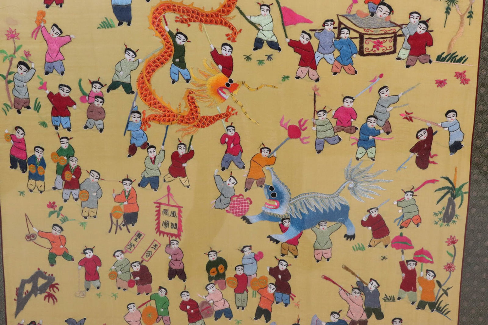 Chinese Needlework on Silk of a Festival: Chinese Needlework on Silk of a Festival Chinese Needlework on Silk of a Festival 54" x 32". Unframed and layed down on foam board. Overall: 4'9"h x 35-1/2"w Sight: 4'5-1/2"h 