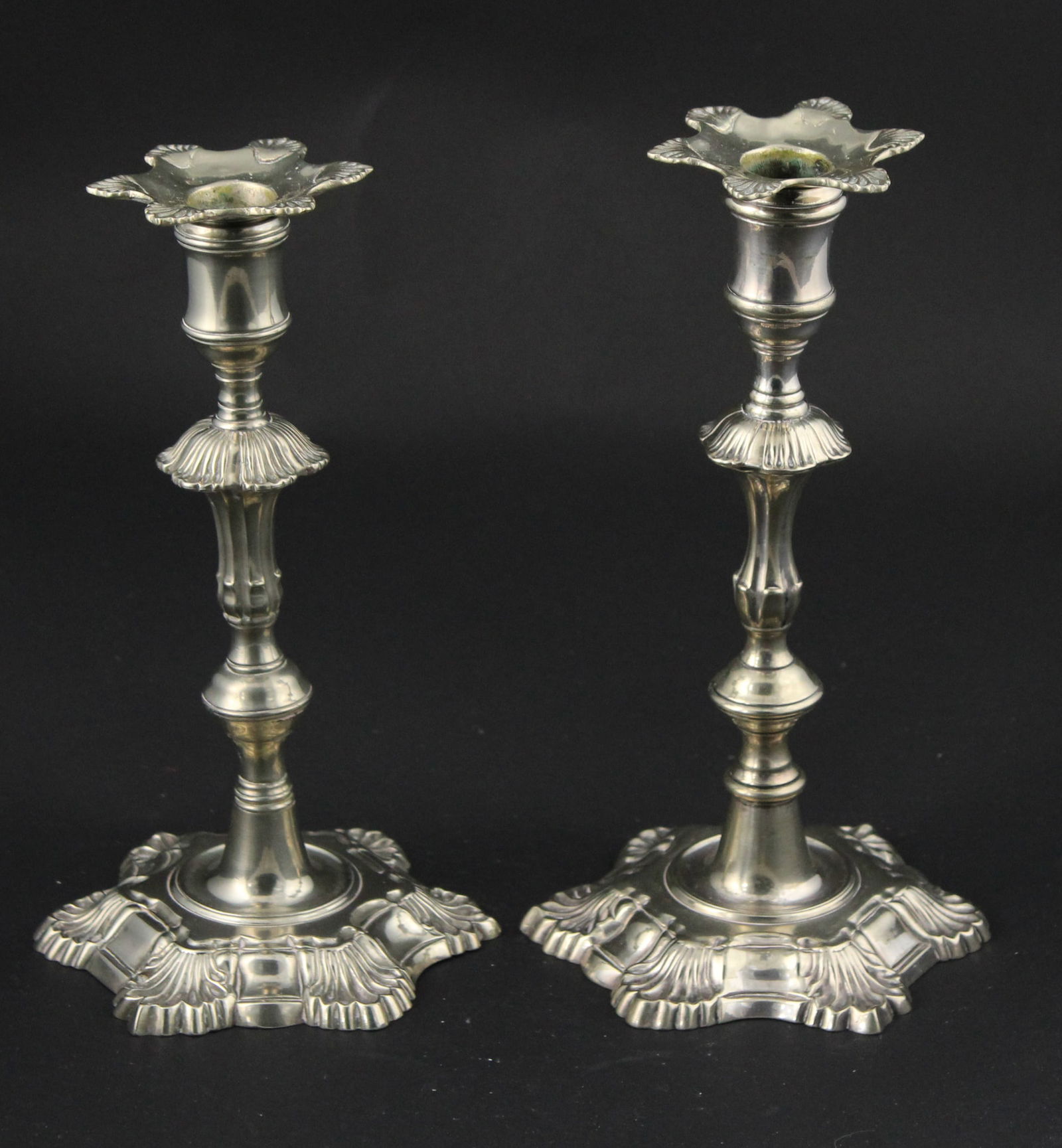 Near Pair of Georgian Paktong Candlesticks: Near Pair of Georgian Paktong CandlesticksCirca, 1760.Provenance: Property from a Private Collection8 1/2 in. (21.6 cm.)