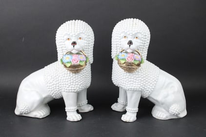 Pair of Continental Porcelain Figures of Poodles