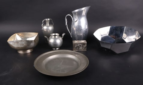 Seven Metal Table Articles