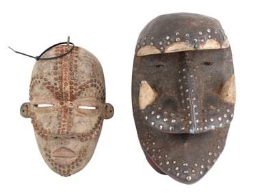 Two African Carved Wood and Studded Masks
