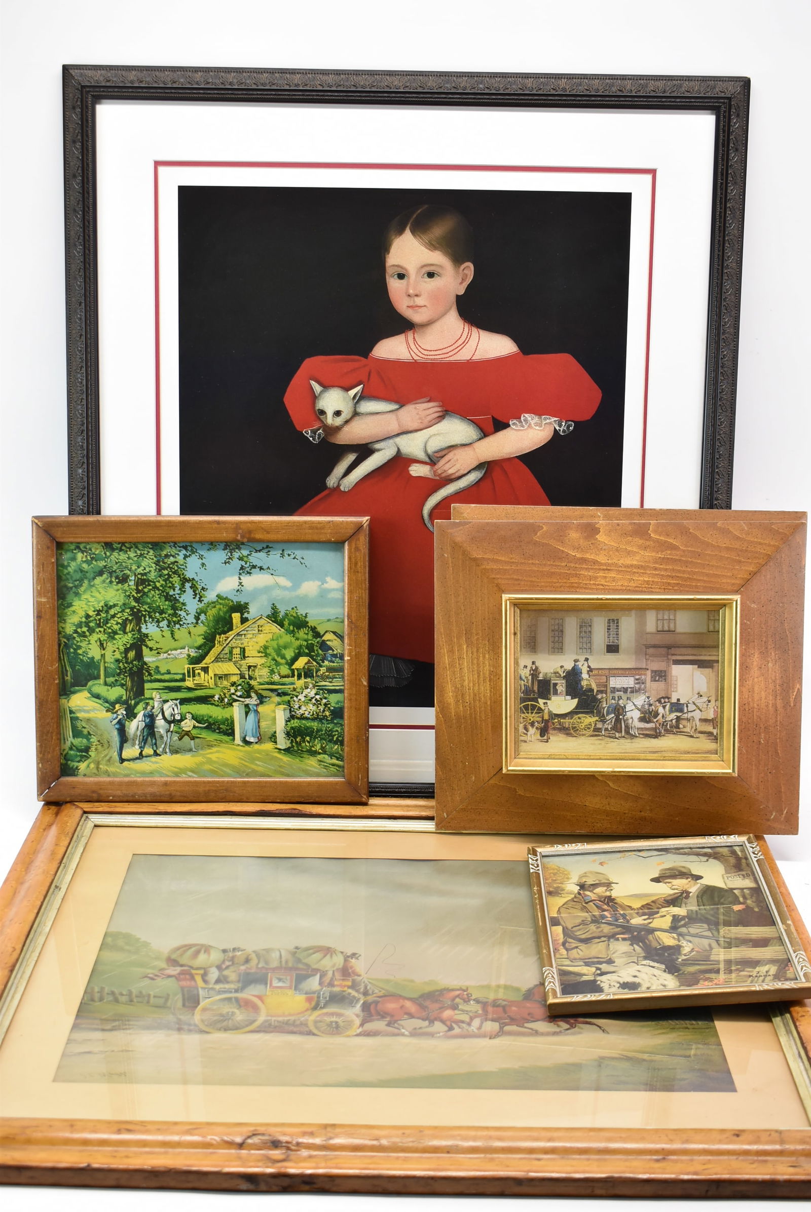 Six Framed Folk and Sporting Prints: Six Framed Folk and Sporting PrintsIncluding an after Ammi Phillips, Girl in Red Dress, J.F. Kernan "Its a Bargain," G.C. Maggs, "Coaching Scene" and others.Provenance: Property from a Private New Yor