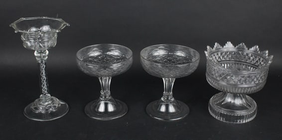 Four Colorless Glass Compotes