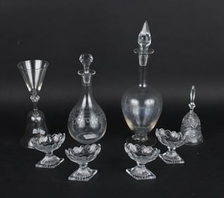 Nine Colorless Glass Table Articles