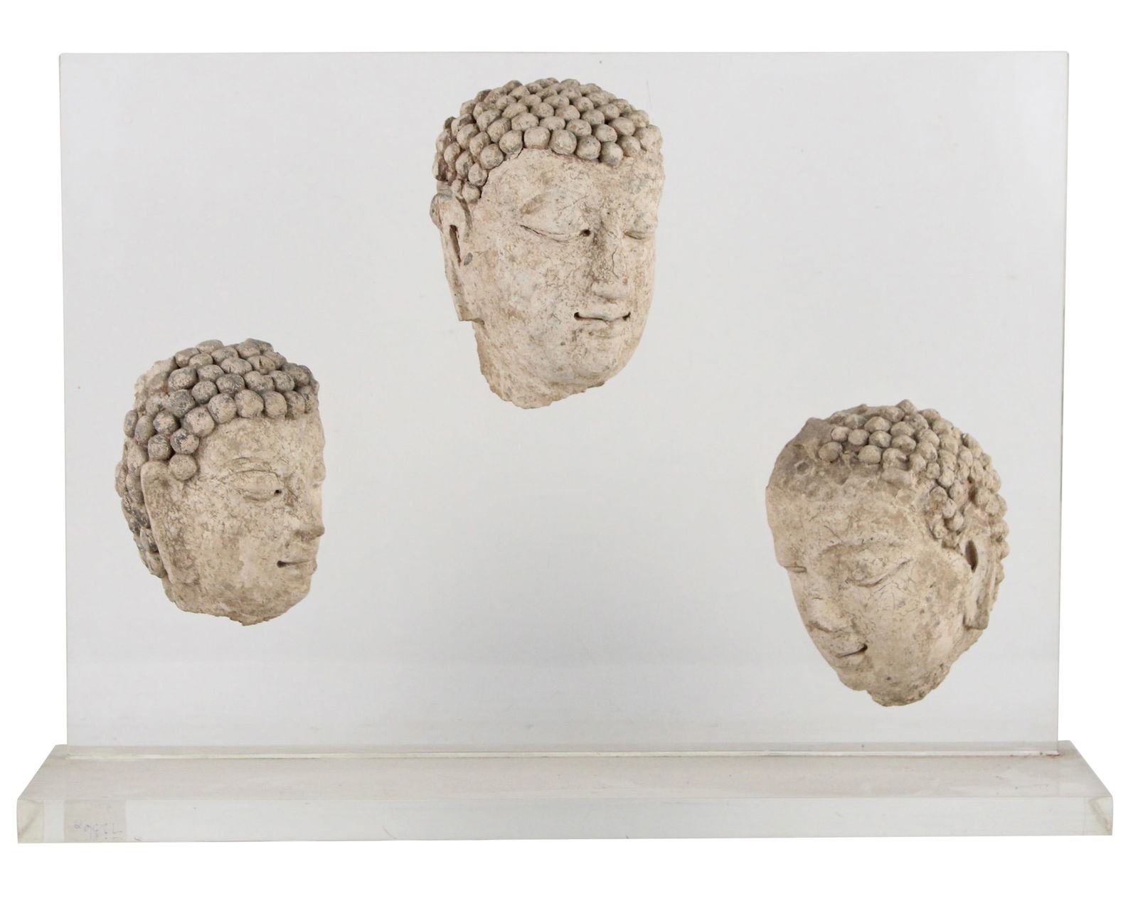 Three Cast-Stone Buddha's Heads (1 of 7)