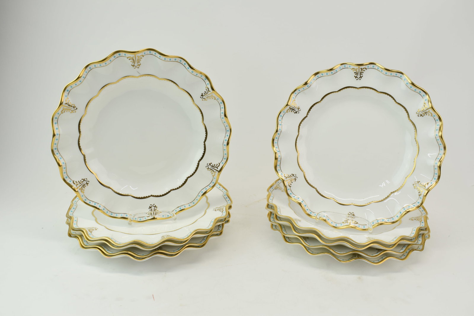 Set of Ten Royal Crown Derby English Bone China Lombardy: Set of Ten Royal Crown Derby English Bone China LombardySet of Ten Royal Crown Derby English Bone China Lombardy, having gilt decoration and scalloped rim. Used condition, wear, worn. Plates measure 1