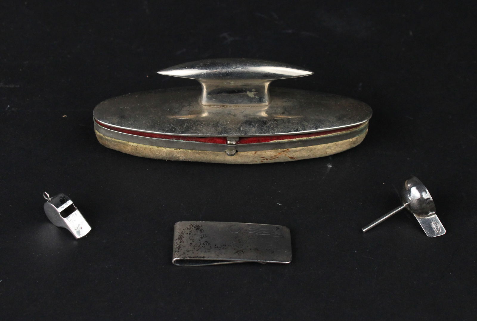 Sterling Silver Whistle, Money Clip, and Funnel: Sterling Silver Whistle, Money Clip, and FunnelTogether with "The Allmon Nail Salve and Enamel " buffing vanity kit.1 1/2 x 6 in. (3.8 x 15.2 cm.)