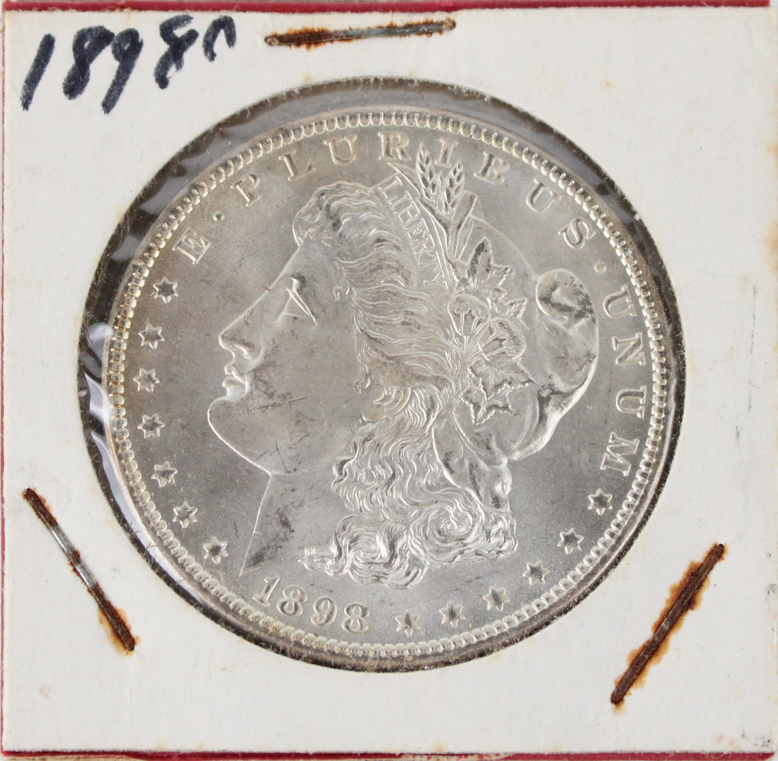 Seven 1898-O Morgan Dollars (1 of 4)