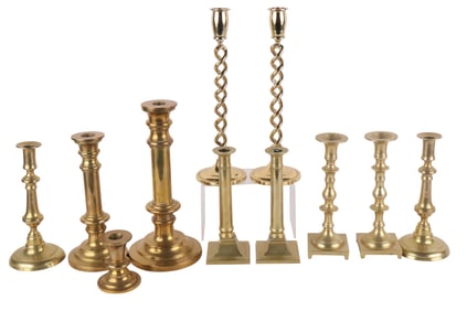 Group of Eleven Cast Brass Candlesticks