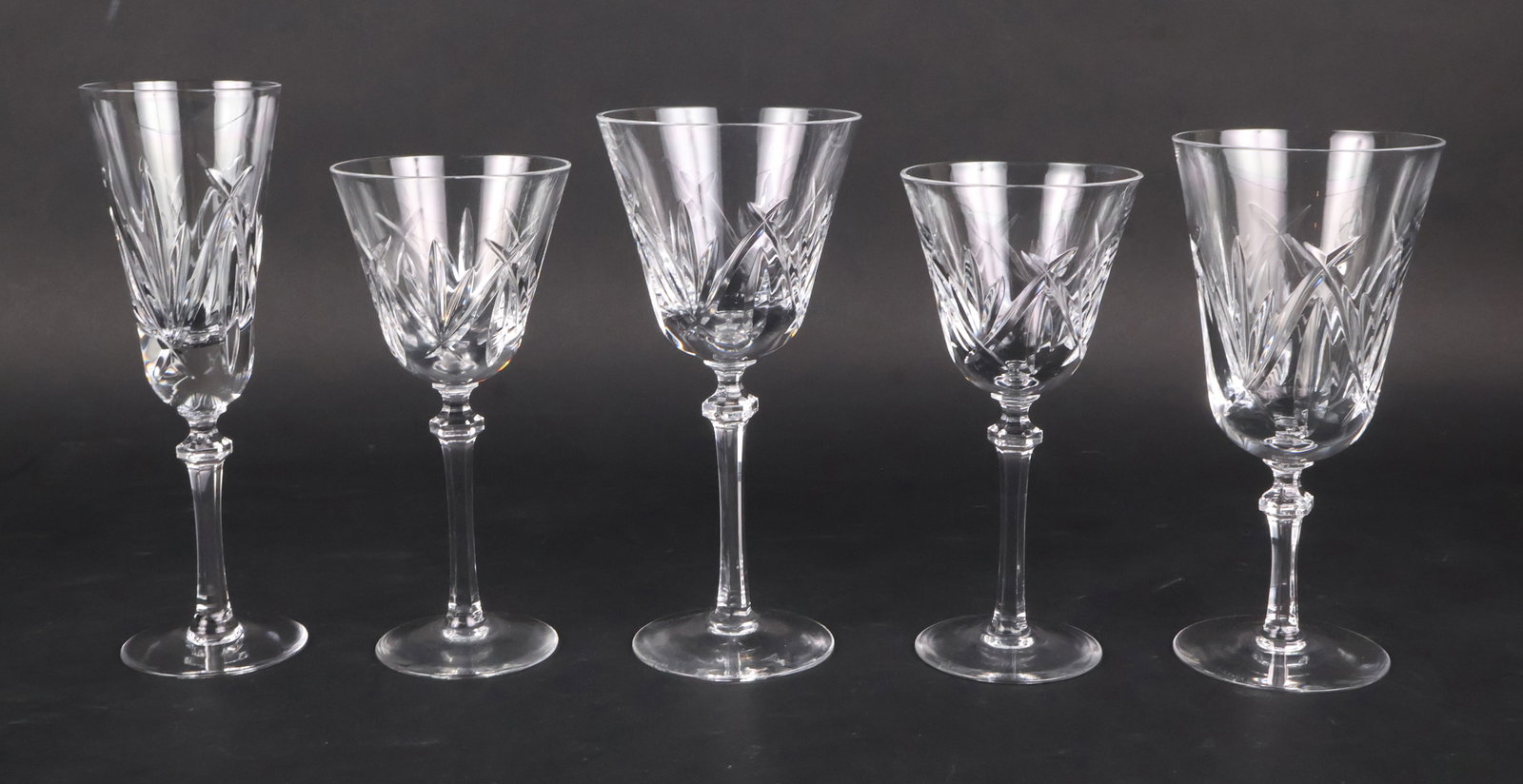 Group of Lenox "Charlotte" Crystal Stemware: Group of Lenox "Charlotte" Crystal Stemware Comprising, 12 champagne flutes, 13 red wine glasses, 10 water goblets, and 11 white wine glasses. 46 pieces Chips, wear. Red Wine: 8 x 3 3/4 in. 