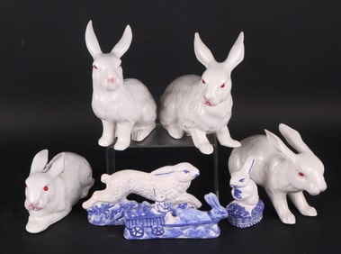 Four White Porcelain Rabbits
