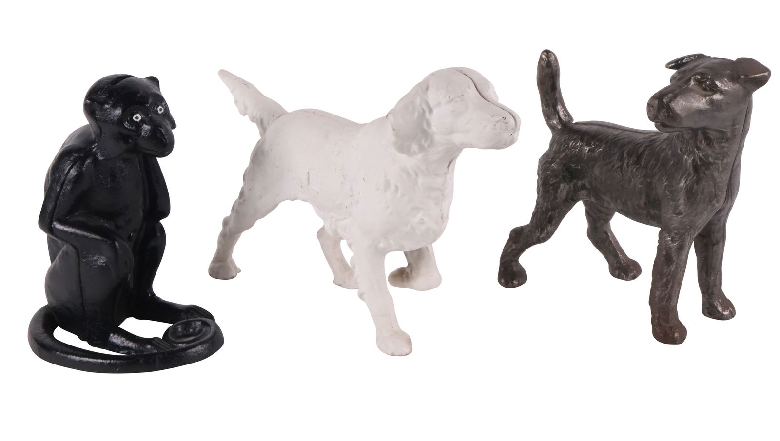 Two Dog-Form Cast-Iron Doorstops: Two Dog-Form Cast-Iron DoorstopsOne a terrier and one a setter. Together with a monkey form cast-iron doorstop. 3 piecesLosses to paint, wear.Largest: 8 3/4 x 15 1/2 x 3 1/2 in. (22.2 x 39.4 x 8.9 cm.