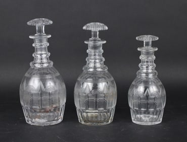 Three Graduated English Cut Glass Three Ring Decanters