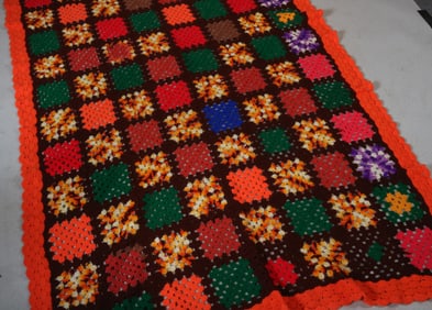 Colorful Quilt with Orange Border