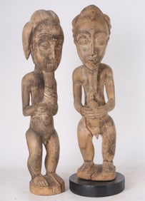 Two African Carved Wood Figures of Men