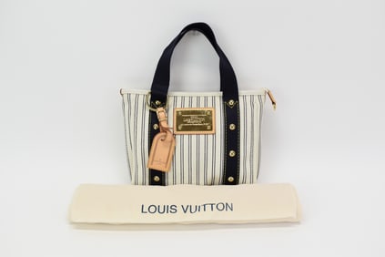 Authentic Louis Vuitton Antigua Cabas PM Tote in Navy Stripe