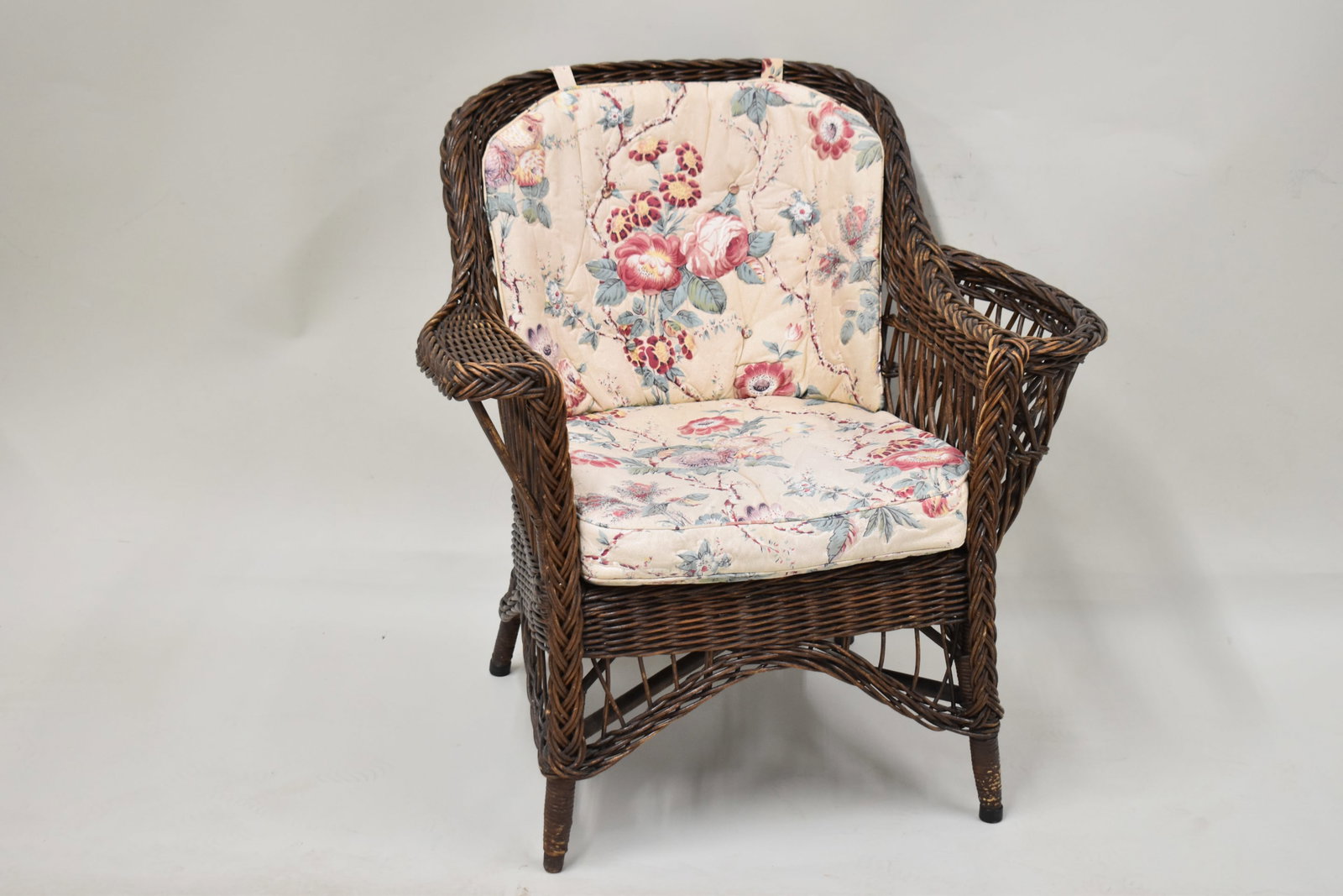 Heywood Wakefield Wicker Chair: Heywood Wakefield Wicker Chair Heywood Wakefield Wicker Chair. Used condition, wear, worn. Measures 31 1/2" tall x 32" wide x 28" deep. Provenance: Property from the Estate of Dr. Richa