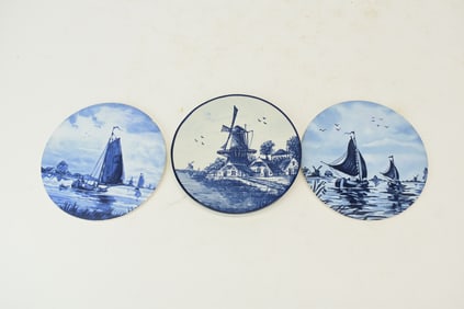 Three Assorted Delft Blue and White Wall Plates