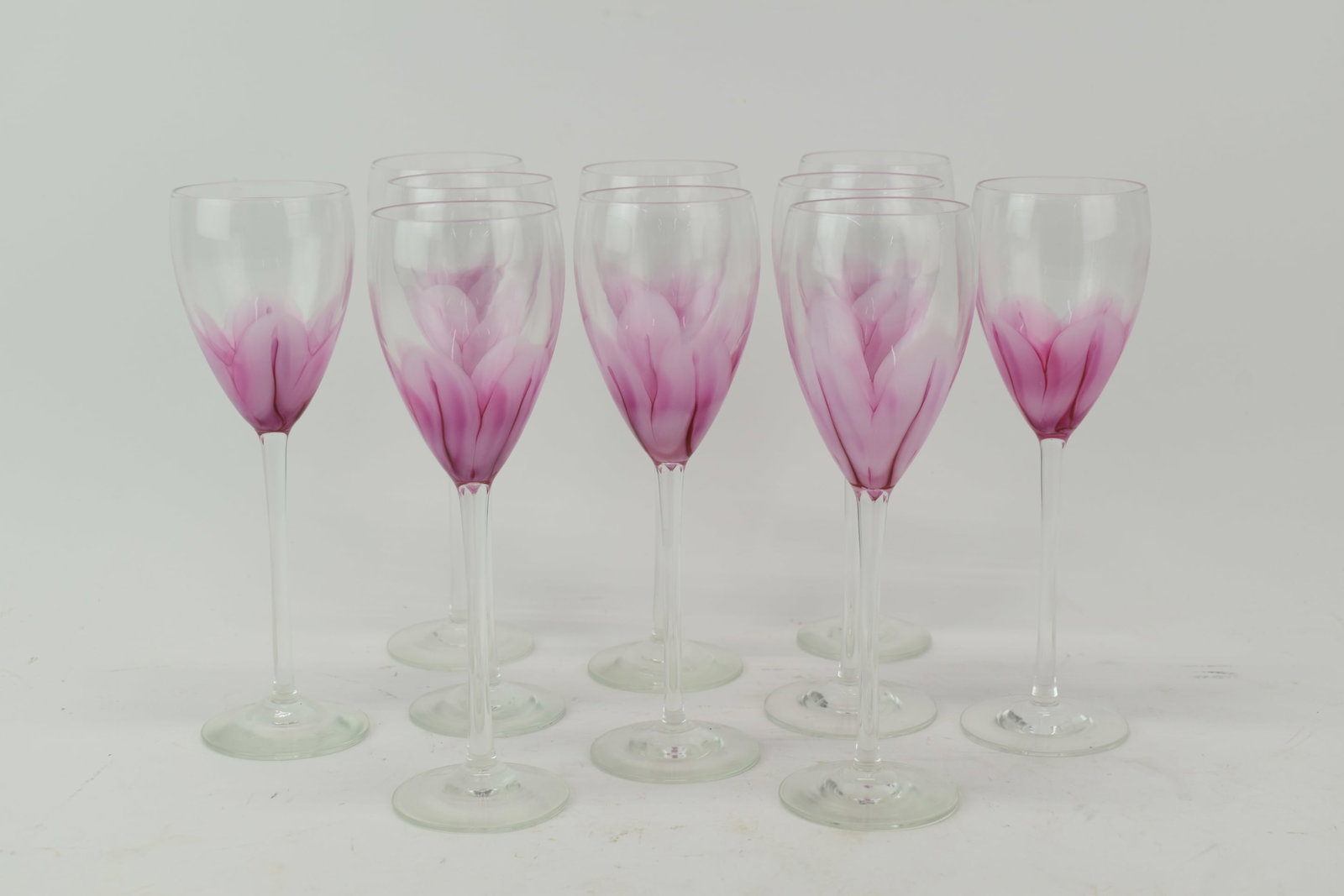 Set of Ten Steven Maslach Tulip Glasses: Set of Ten Steven Maslach Tulip Glasses Set of Ten Steven Maslach Tulip Glasses. Used condition. Each measures approx 9" tall x 2 3/4" dia at top. Provenance: Property from the Estate of Dr.
