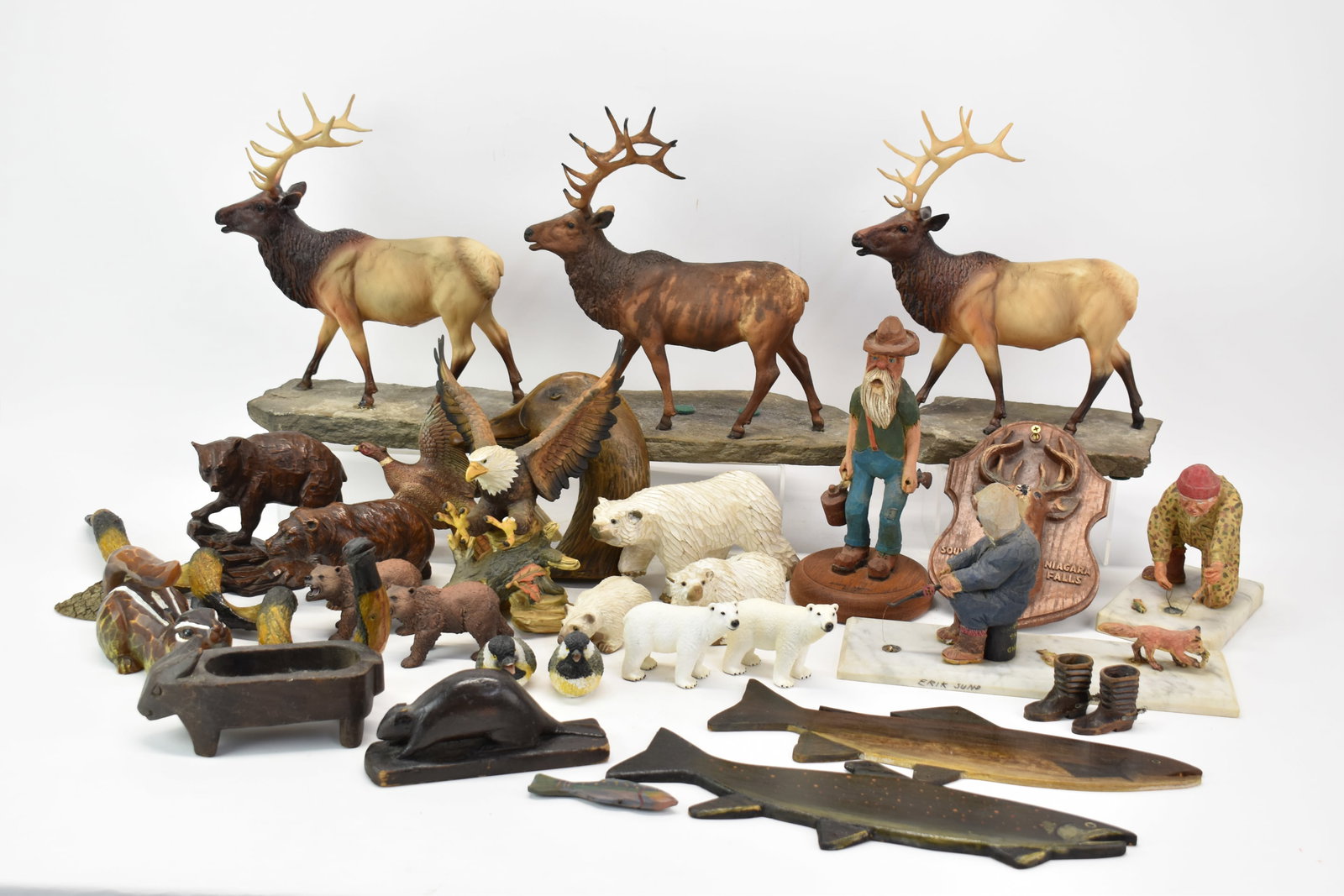 Group of Assorted Wooden and Composition Animals: Group of Assorted Wooden and Composition Animals Group of Assorted Wooden and Composition Animals. Comprising Polar Bears, Eagle, Squirrel, Snake, Bear, Trout and More. Together with three plastic Car