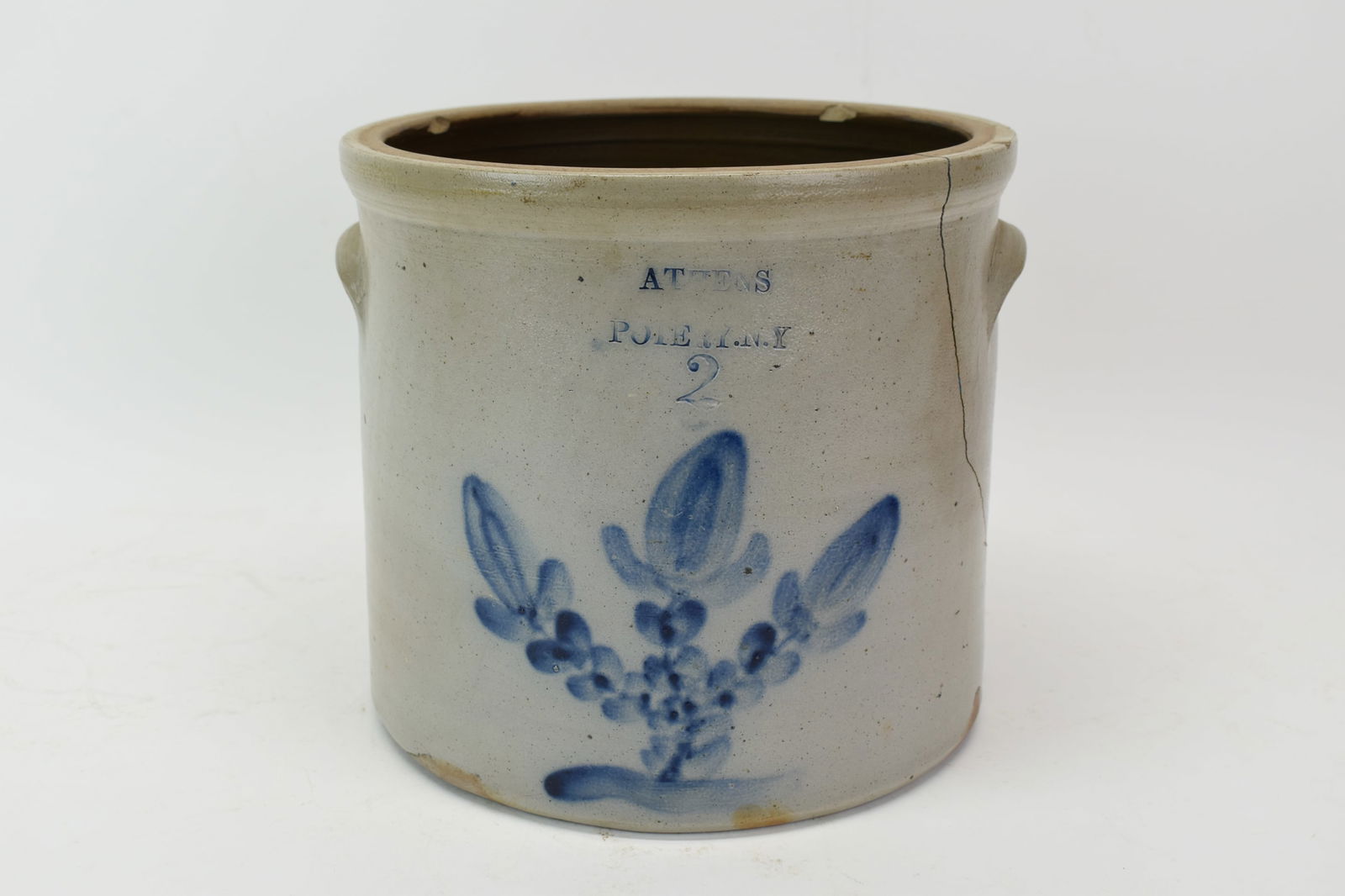 Antique Athens Potery New York Floral Decorated Crock: Antique Athens Potery New York Floral Decorated CrockAntique Athens Potery New York Floral Decorated Stoneware Crock. Used condition, rim chips, crack to side. 9" tall x 10 1/4" diameter