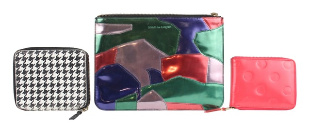Three Comme des Garcons Wallets