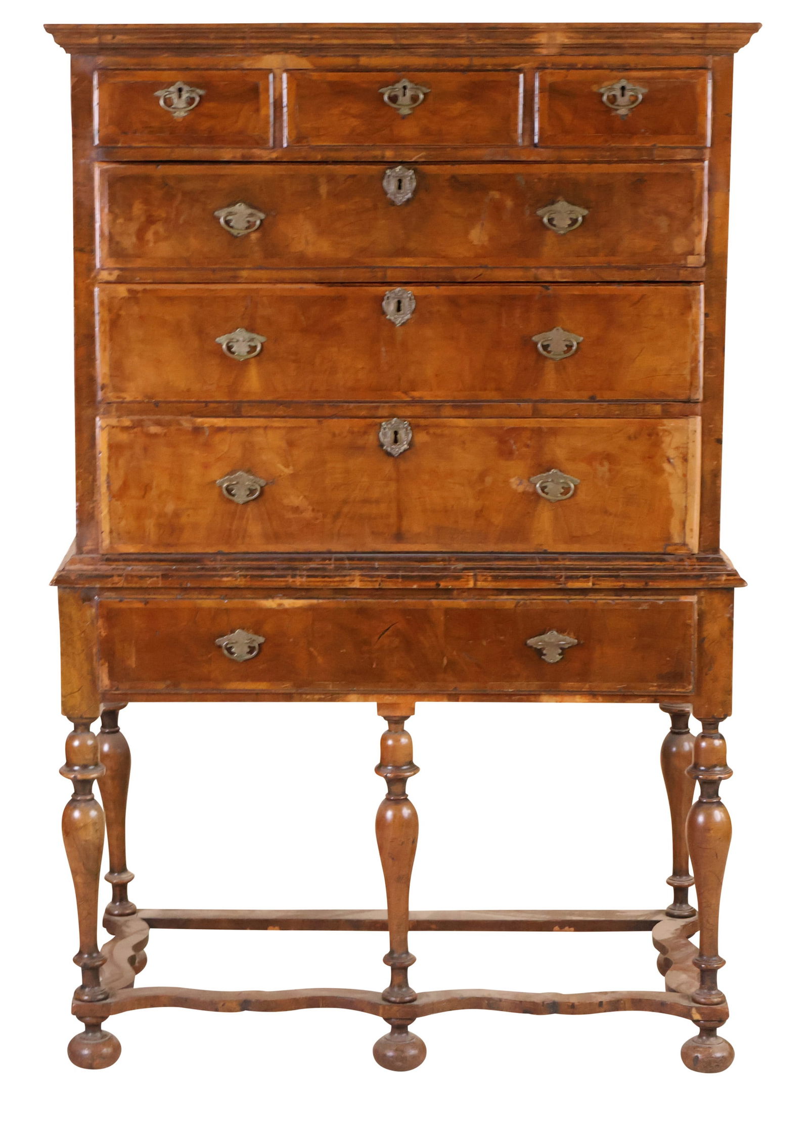 Baroque Walnut Veneered Tall Chest of Drawers: Baroque Walnut Veneered Tall Chest of DrawersEnglish, 18th C. and later.Restorations. Top and bottom together by association.63 1/2 x 41 1/2 x 20 5/8 in. (161.3 x 105.4 x 52.4 cm.)