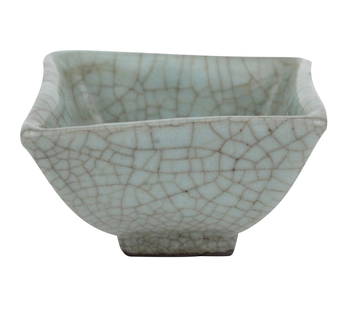 Celadon Glazed Ceramic Square Dish: Celadon Glazed Ceramic Square DishA vintage square ceramic dish featuring a distinctive crackle glaze pattern. The base of the dish displays a label from the 1928 Exhibition, suggesting historical sig