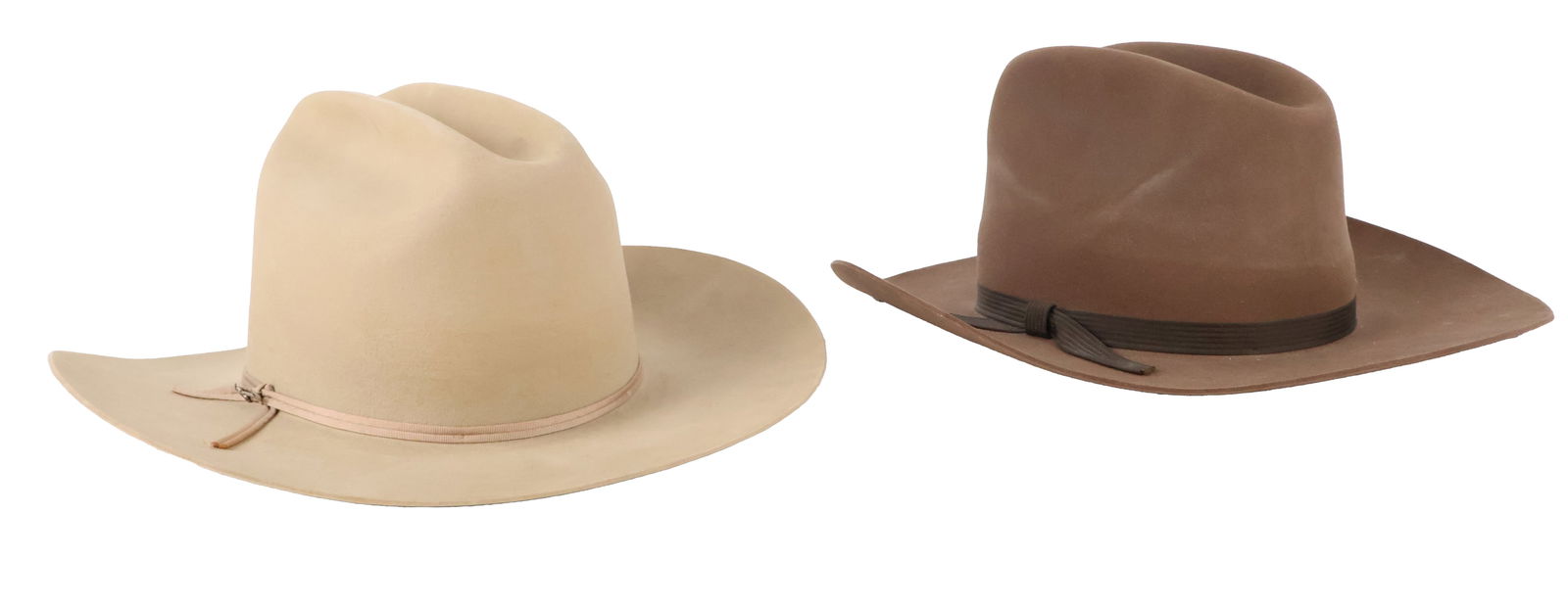 Two Stetson Cowboy Hats: Two Stetson Cowboy HatsBoth size 7-1/8.6 1/2 x 14 1/2 x 15 1/2 in. (16.5 x 36.8 x 39.4 cm.)