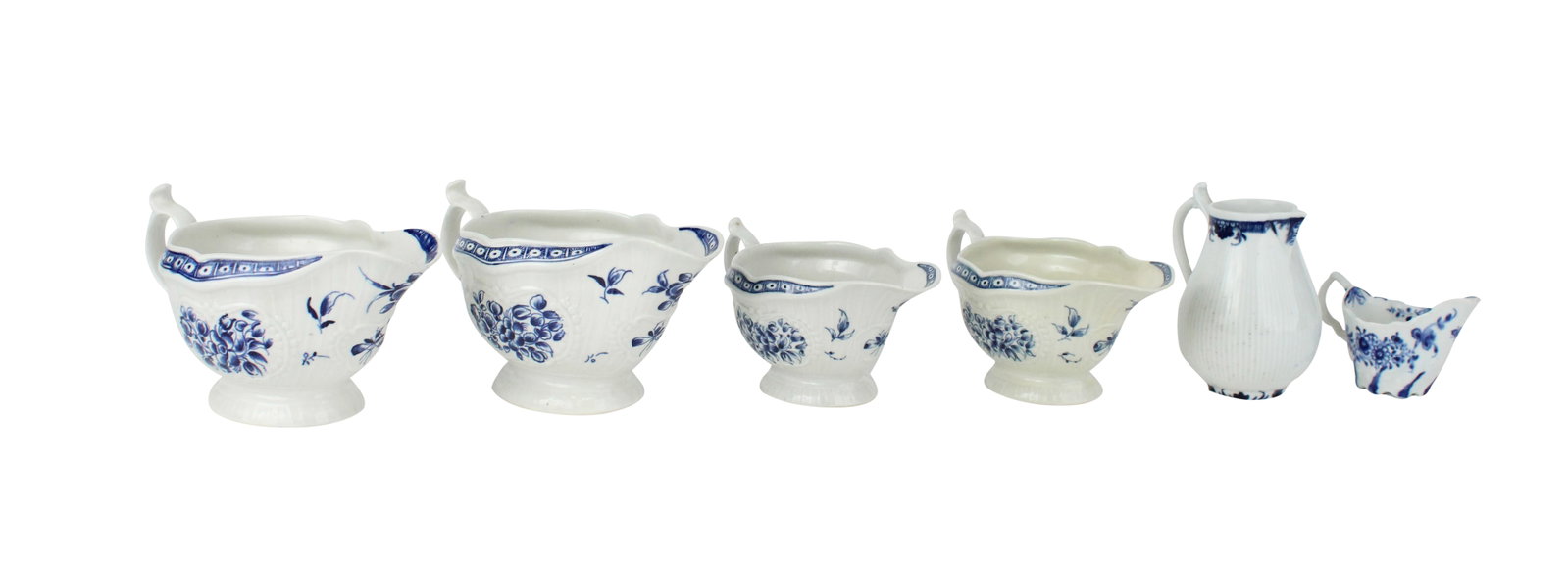 Four Royal Worcester Blue and White Porcelain Sauce Boats: Four Royal Worcester Blue and White Porcelain Sauce Boats Marked "C" underside. Together with a Royal Worcester creamer and a small blue and white sauce boat. 6 pieces Largest: 4 1/4 x 7 3/4