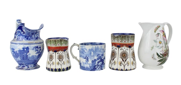 Four Porcelain Pitchers and a Cann