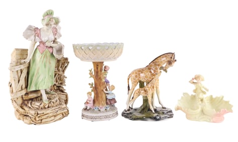Four Porcelain Figural Table Articles