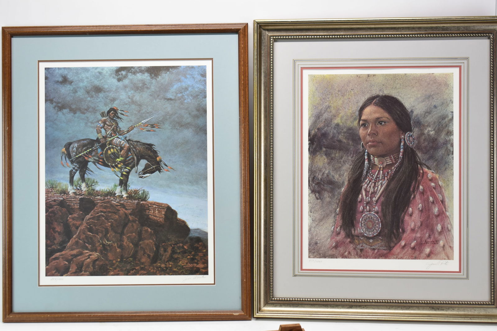 Two Vintage Jim Abeita Limited Edition Prints: Two Vintage Jim Abeita Limited Edition PrintsTwo Vintage Jim Abeita Limited Edition Prints. One depicting Native American Woman 417/1000 and the other of a Warrior on horseback 258/1000 each with arti