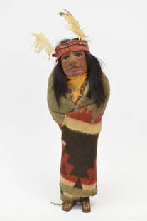 Early 14" Skookum Native American Chief Doll: Early 14" Skookum Native American Chief DollEarly 14" Skookum Native American Chief Doll, having stuffed with straw body with wooden paint decorated feet and composition face. Unmarked, used