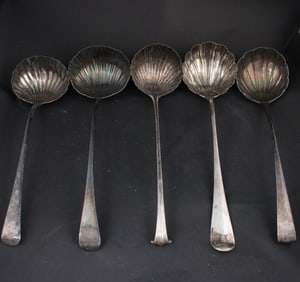 Five Georgian English and Irish Sterling Scalloped Punch Ladles