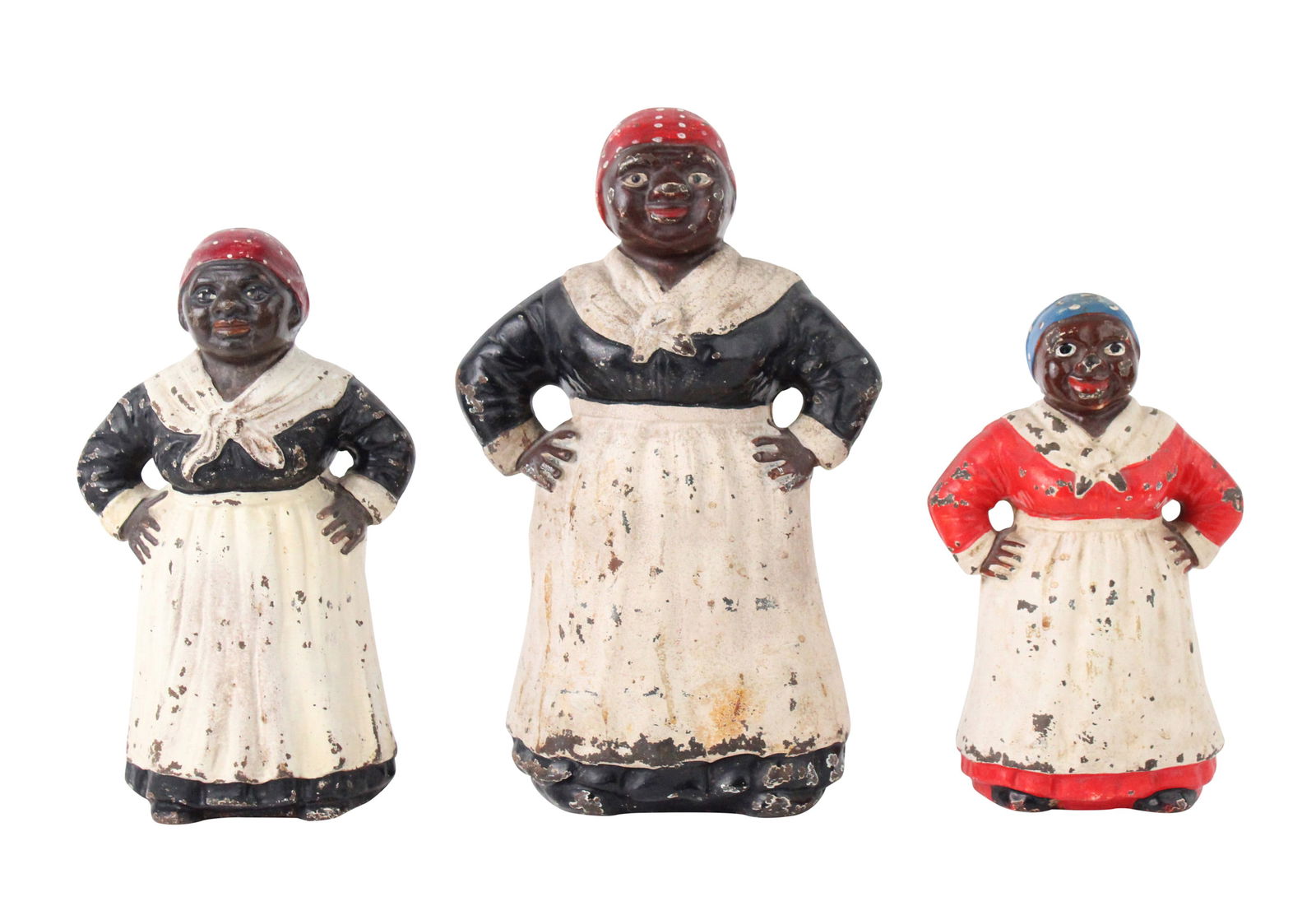 Three Painted Cast-Iron Aunt Jemima Doorstops: Three Painted Cast-Iron Aunt Jemima Doorstops19th/20th C.Losses, wear, surface distress.Largest: 12 x 8 x 5 in. (30.5 x 20.3 x 12.7 cm.)