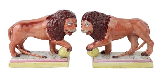 Pair of Staffordshire Polychrome Glazed Lions