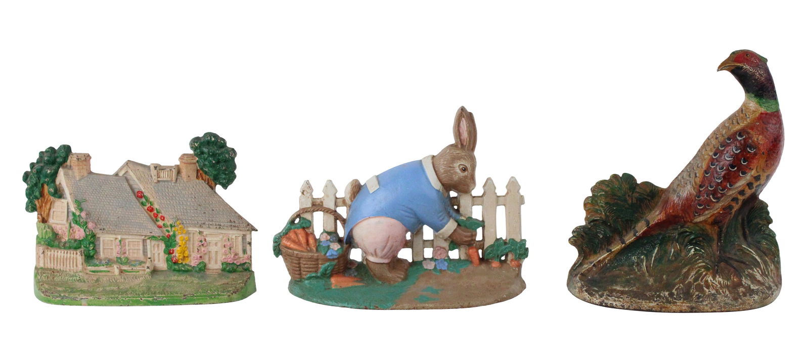 Peter Rabbit Form Painted Cast-Iron Doorstop: Peter Rabbit Form Painted Cast-Iron DoorstopTogether with a pheasant form doorstop and a country house form doorstop.Losses, wear, surface distress.Largest: 8 1/2 x 7 1/2 x 4 in. (21.6 x 19.1 x 10.2 c