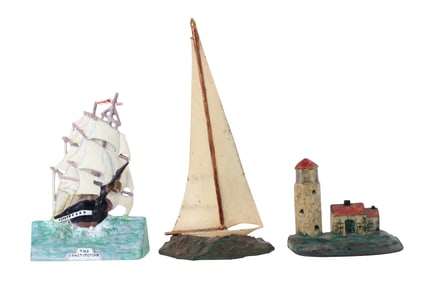 Three Nautical Painted Cast-Iron Doorstops