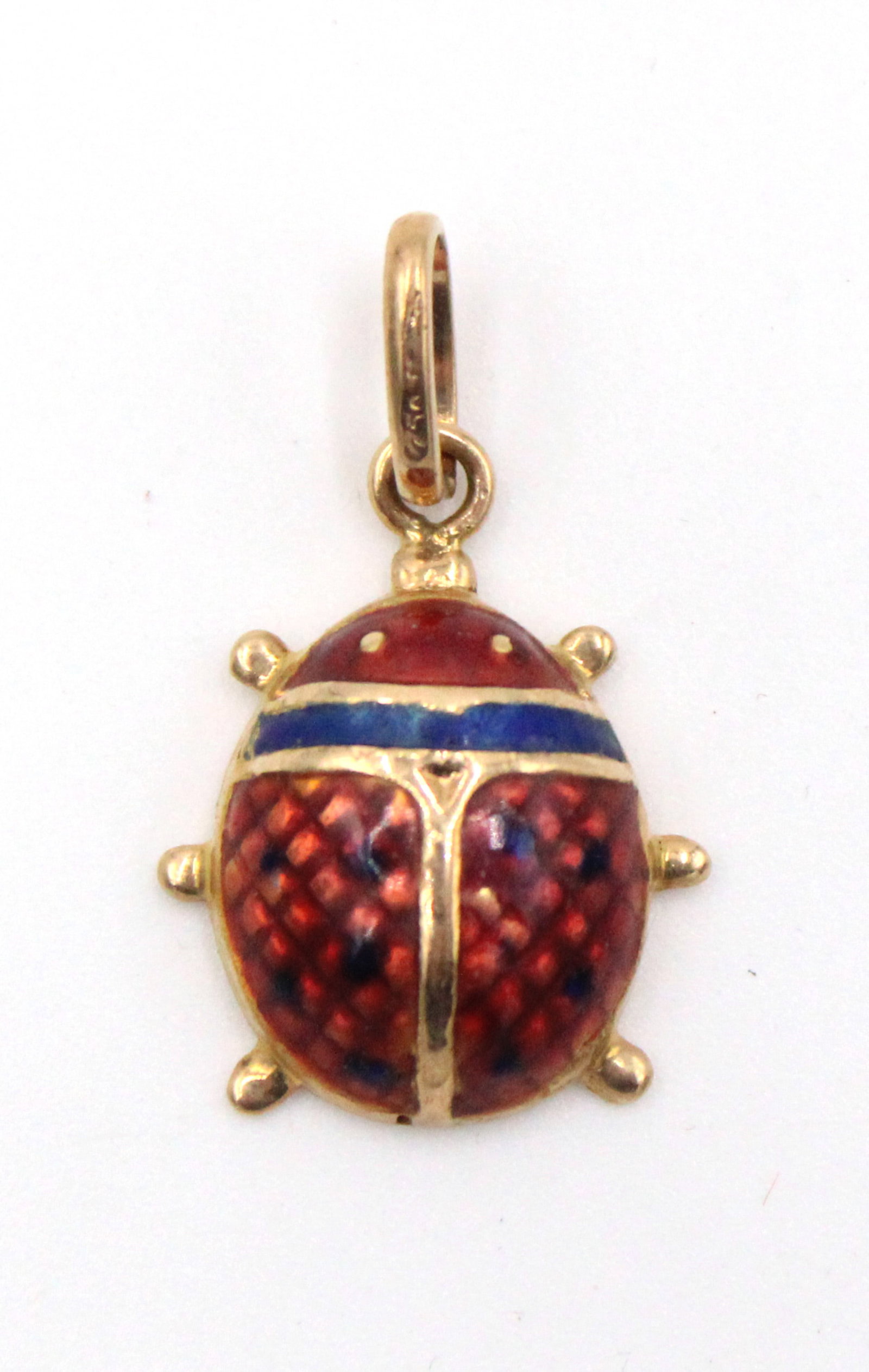 18K Gold & Enamel Ladybug: 18K Gold & Enamel Ladybug Marked on bale. 0 3/8 x 0 3/4 x 0 3/8 in. (1 x 1.9 x 1 cm.)
