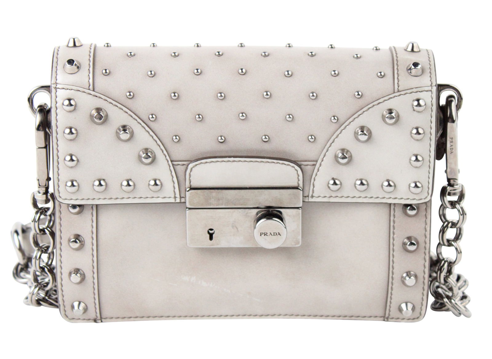 Prada Grey Leather Spazzolato Studded Mini Sound Bag: Prada Grey Leather Spazzolato Studded Mini Sound BagWear associated with use. This bag has been authenticated.5 1/2 x 7 x 2 in. (14 x 17.8 x 5.1 cm.)