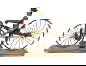 Folk Art Carved and Painted Cyclist on Bike