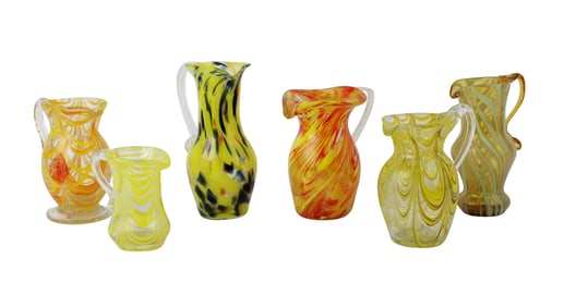 Six Yellow Nailsea Art Glass Pitchers