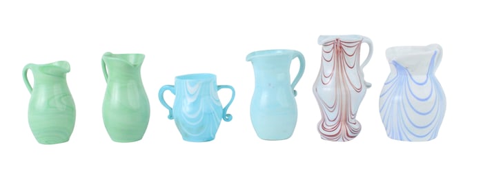 Six Opaque Nailsea Art Glass Pitchers