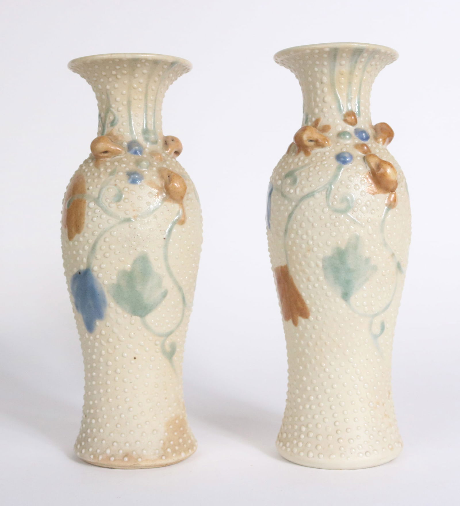 Pair of Floral Decorated Vases: Pair of Floral Decorated VasesUnmarked.9 x 3 x 3 in. (22.9 x 7.6 x 7.6 cm.)
