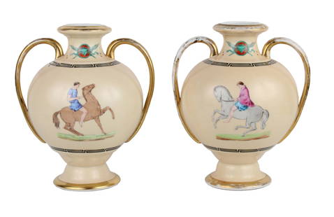 Pair of Porcelain Double Handled Vases: Pair of Porcelain Double Handled VasesIn the Greek taste, featuring men on horseback.Wear to handles.10 1/2 x 9 1/2 x 7 1/2 in. (26.7 x 24.1 x 19.1 cm.)