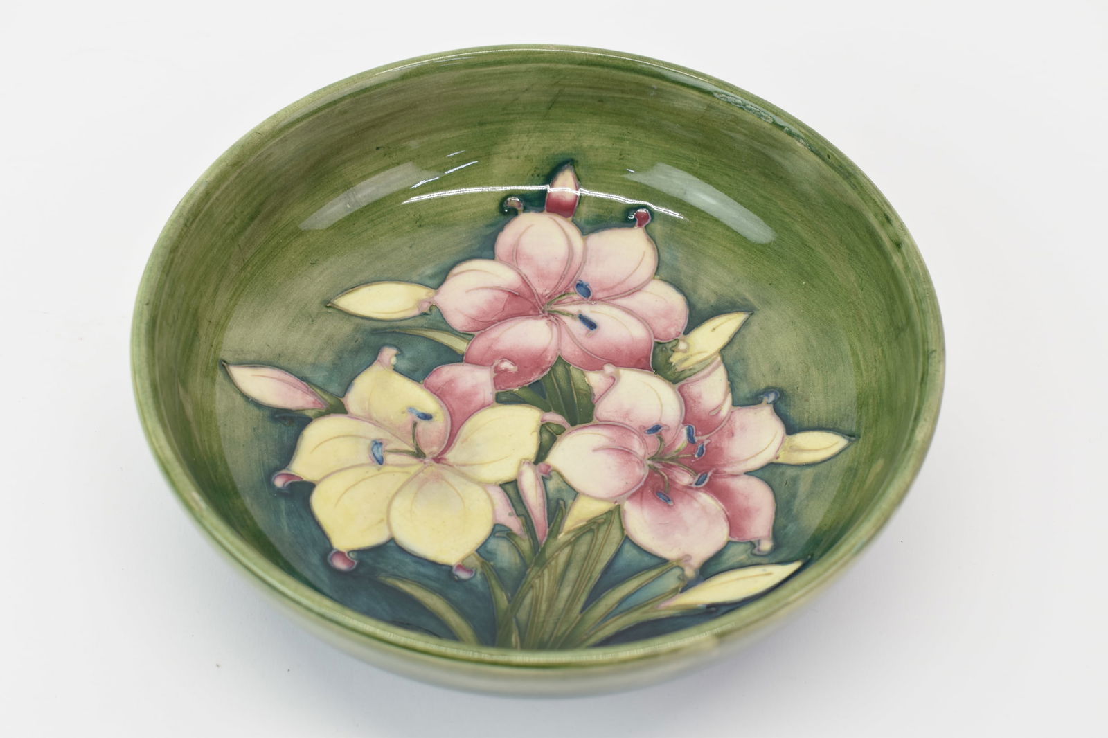 William Moorcroft Floral Decorated Bowl: William Moorcroft Floral Decorated BowlWilliam Moorcroft Floral Decorated Bowl. Used condition, 8 5/8" diameter x 2 5/8"