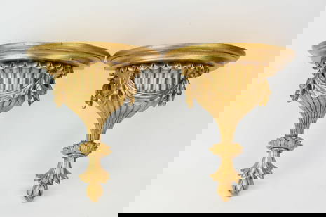 Pair of Gilt Painted Wall Brackets: Pair of Gilt Painted Wall BracketsPair of Gilt Painted Wall Brackets having shell and drape design. Used condition, paint residue. each measures 5" tall x 13" wide x 8" deep